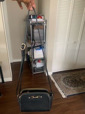 Black Crossbody Bag With Adjustable Strap and Three Zipper Pockets